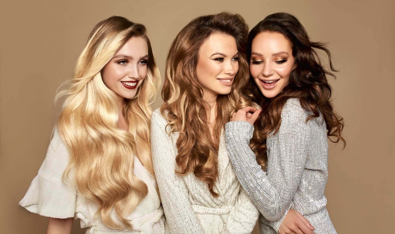Three women with their Hairdreams hair extensions