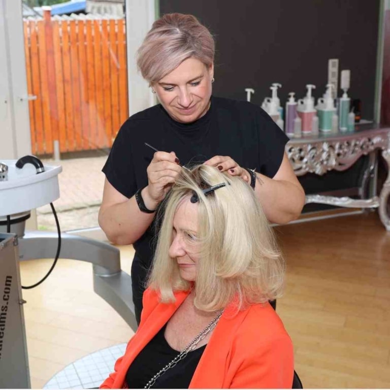 Hairdreams hairdresser applicates the MicroLines.